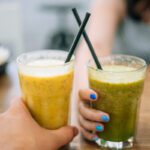 Man and Woman Enjoy Healthy Juice Drinks in St. Clair Shores