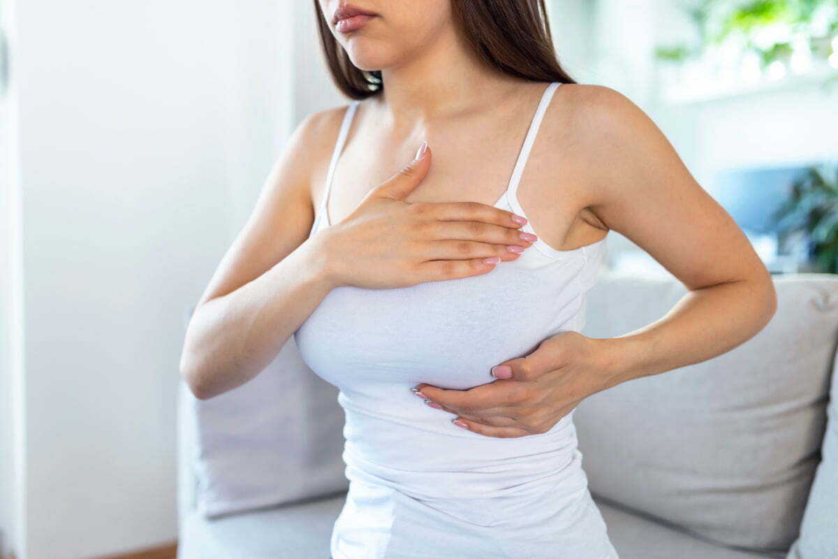 Do Your Large Breasts Cause Back Pain? Here's What To Do